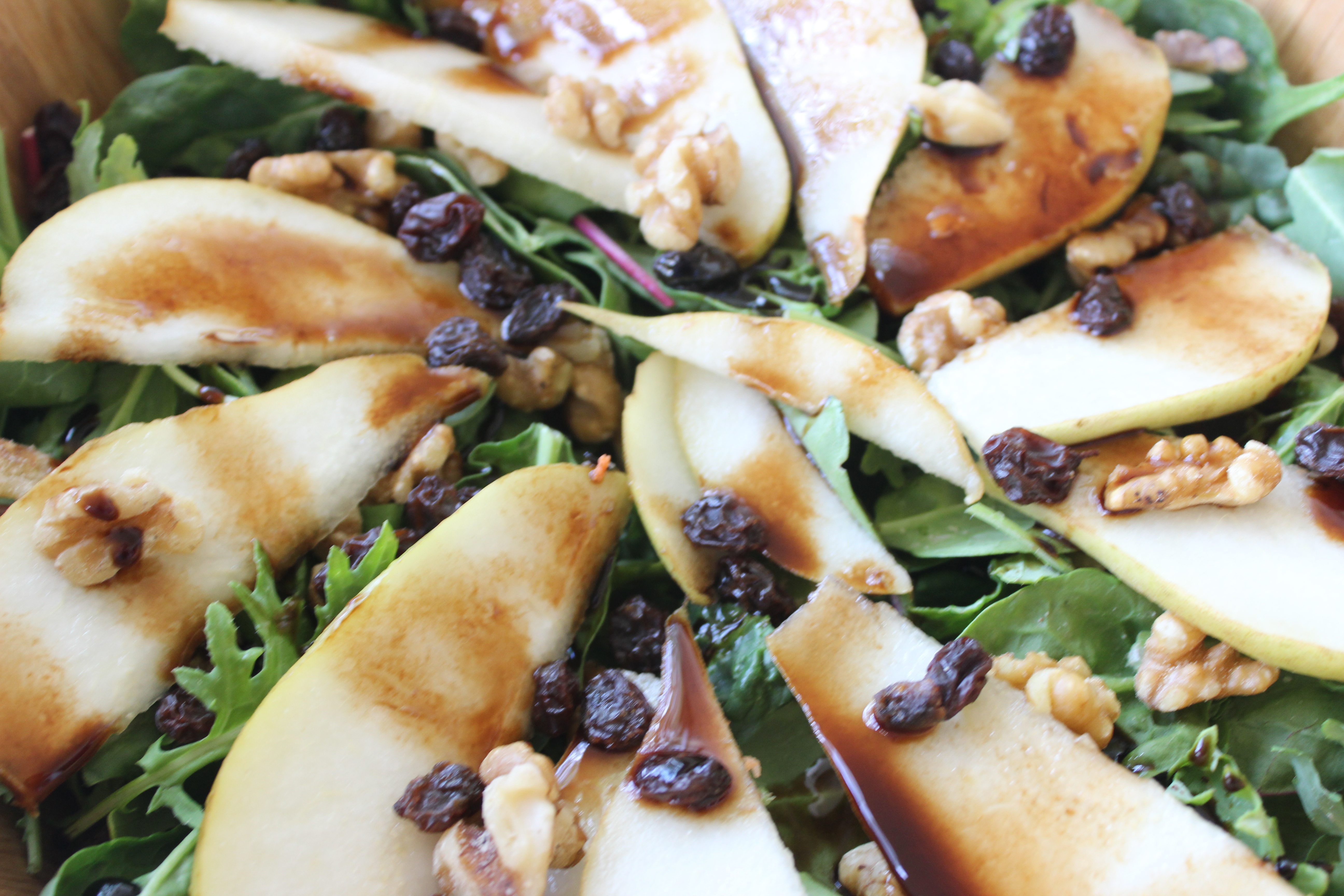 Power greens with pear walnuts balsamic
