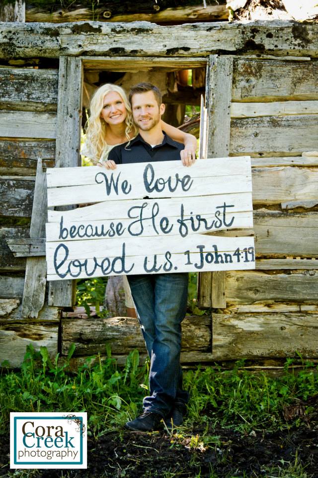 holding the sign