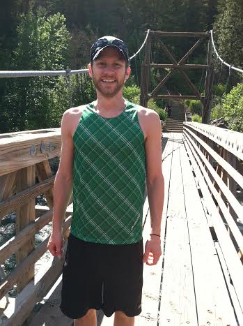 marc walking over bridge