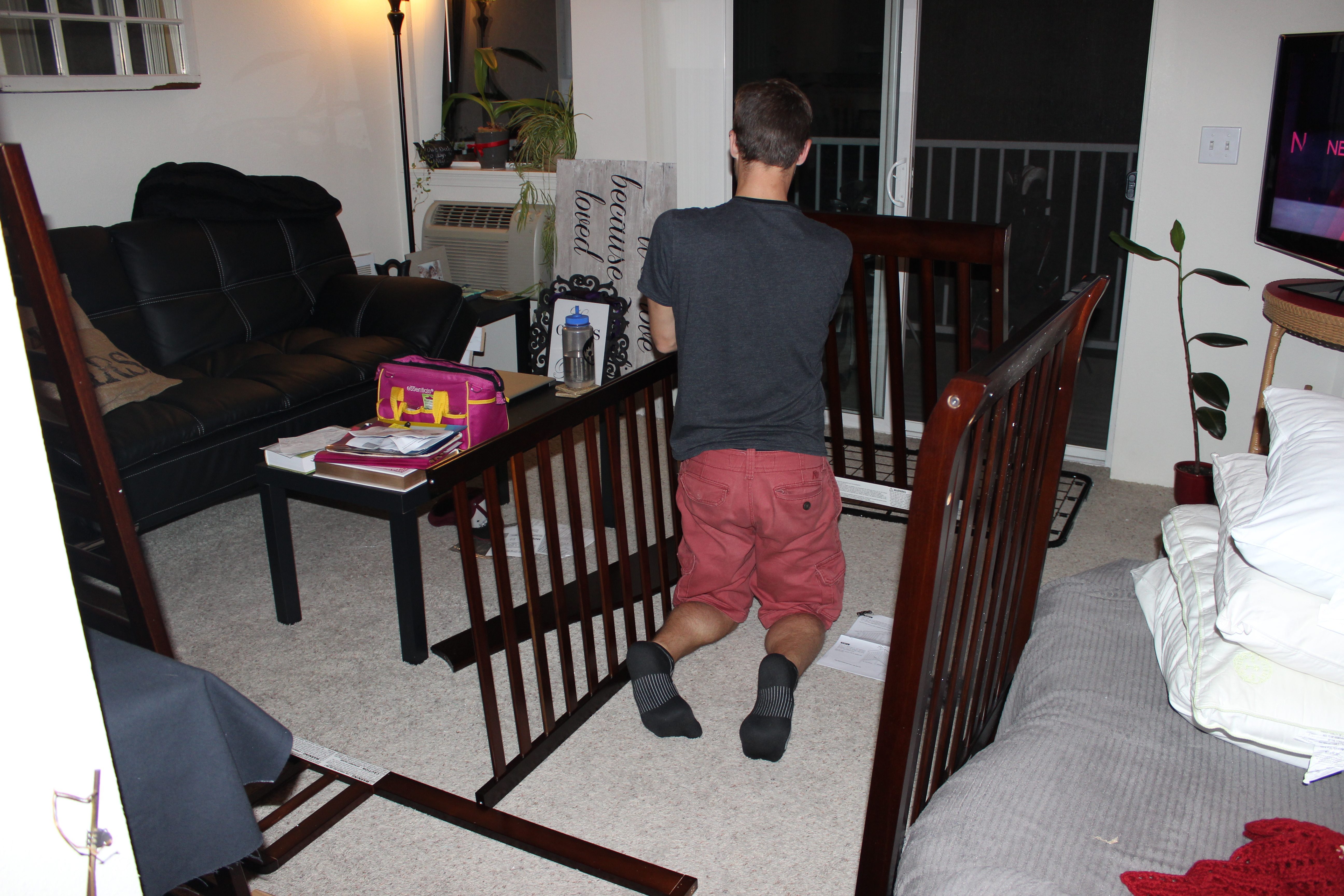 marc putting together the crib (2)